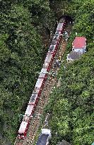 Mudslide derails commuter train in Kanagawa Pref.