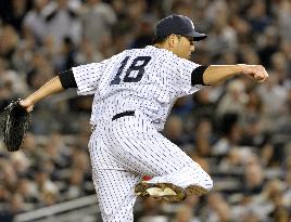 Kuroda goes 8 strong as Yankees win