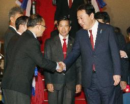 Japan's PM Noda arrives in Laos for ASEM summit