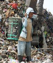 Children collecting garbage