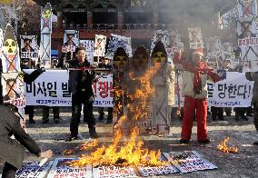 Protests in Seoul against N. Korean rocket launch