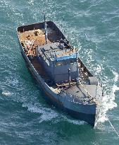 N. Korean boat towed