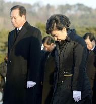Park visits father's grave