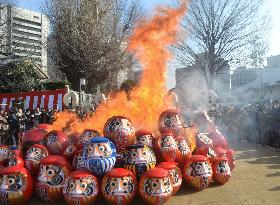 Burning Daruma dolls