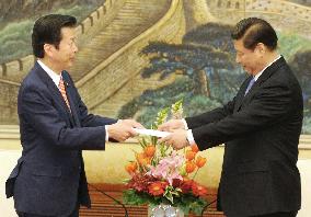 Japan party chief meets China leader Xi