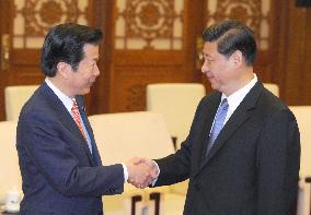 Chinese leader Xi meets with Japan party chief