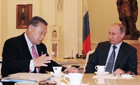 Ex-Japan PM Mori meets Putin