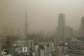 Dusty haze covers Tokyo