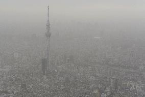 Dusty haze covers Tokyo