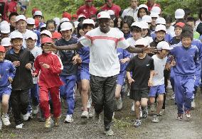 Kenyan Olympic marathon medalist passes 20th yr of life in Japan