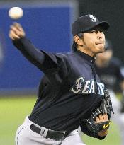 Iwakuma works 6 innings in strong debut