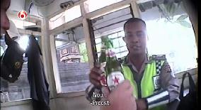 Video of Indonesian policeman getting bribe