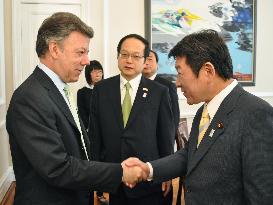 Japan minister Motegi meets Columbia President Santos