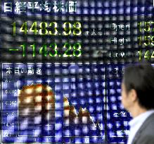 Nikkei tumbles over 7%
