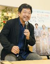 Film director Koreeda returns from Cannes