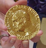 Russian editor's Nobel medal auctioned off for $104 mil. for Ukraine