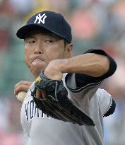 Kuroda gets 9th victory