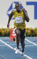 Bolt wins 100m at world c'ships