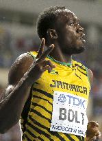 Bolt wins 100m at world c'ships