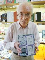 Man selling karuta card games at 90-yr-old store