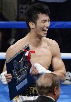 Murata gets TKO win in pro debut