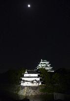 Harvest moon over Nagoya castle