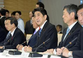 Abe announces sales tax hike