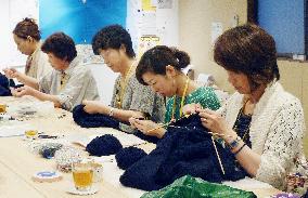 Women in Kesennuma knit to build world-class brand