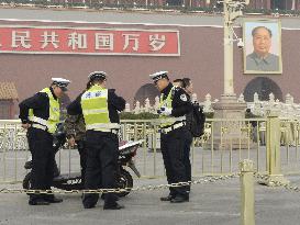 Vehicle plows into crowd at Tiananmen Square