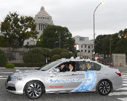 Abe in automated driving car