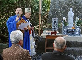 Buddhist priests reviewing funerals