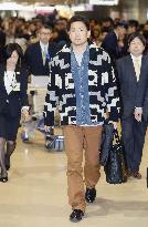 Tanaka back in Japan