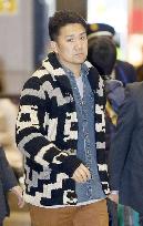 Tanaka back in Japan