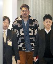Tanaka back in Japan