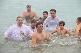 Russian Orthodox Christians bathe in Black Sea
