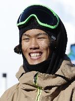 Snowboarder Kadono smiles during interview after practice