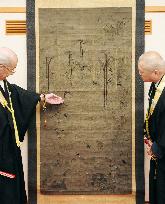 Hair embroidery shows Buddha in nirvana