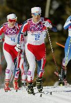 Norway's Marit Bjoergen wins Olympic women's 15-kilometer skiathlon