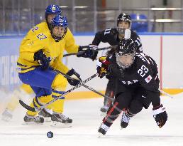 Nakamura chases puck in women's hockey prelim at Sochi