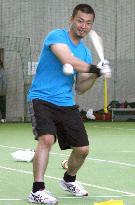 Japanese player Aoki practices batting in preseason training