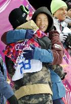 Japan's Aono hugs Hiraoka after men's halfpipe event