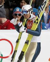 Japan Nordic combined skier A. Watabe reacts after jumping