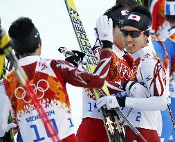 Japan's silver medalist Watabe congratulated by brother