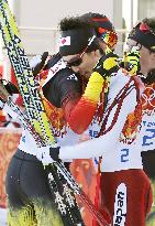 Frenzel, Watabe embrace each other after Nordic combined duel