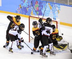 Japan against Germany in women's ice hockey at Sochi
