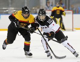 Japan's Yoneyama in women's ice hockey against Germany