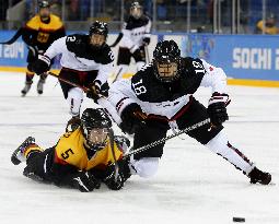 Japan's Sakagami in women's hockey against Germany
