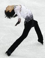 Japan's figure skater Hanyu performs "Bauer" bend in free program