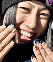 Japanese freestyle skier Mitsuboshi shows off decorated nails
