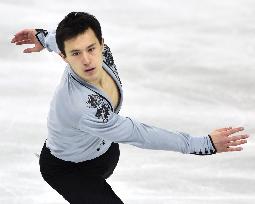 Canada's Chan performs for silver medal in figure skating at Sochi